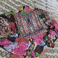 Cotton Kantha Fabric Bomber Jacket from Open Hearts Mend, designed to fit sizes 8 to 12. Each jacket is a unique expression of recycled fashion."