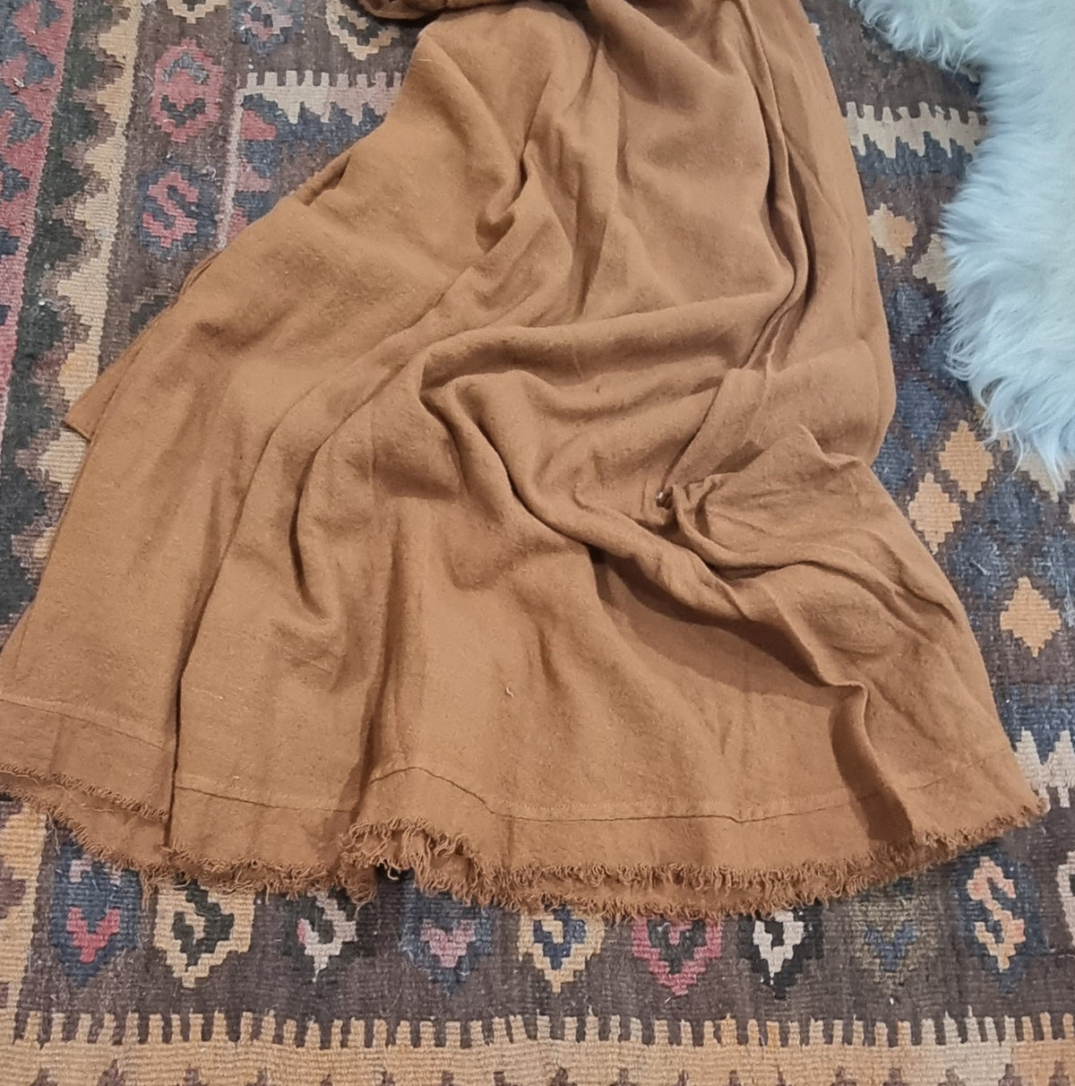 Hand-Dyed Cotton Wrap Skirt from Open Hearts Mend, crafted with hand-woven cotton and uniquely dyed in earthy tones. Approximately 90cm long, suitable for sizes 8 to 16.