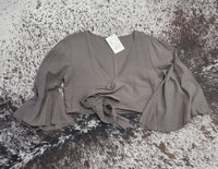  Hand-Dyed Cotton Wrap Tops from Open Hearts Mend, featuring sleeves and a waistline wrap design for sizes 8 to 12. Available in earthy hues reflecting natural beauty."