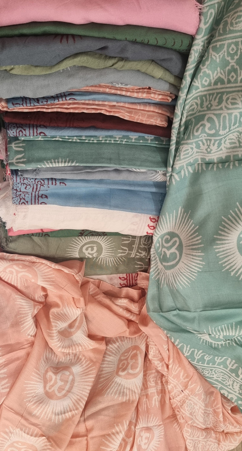 "OM Symbol Cotton Scarves/Sarongs from Open Hearts Mend, versatile as scarves or sarongs, featuring high-quality cotton and the sacred OM symbol for spiritual elegance."