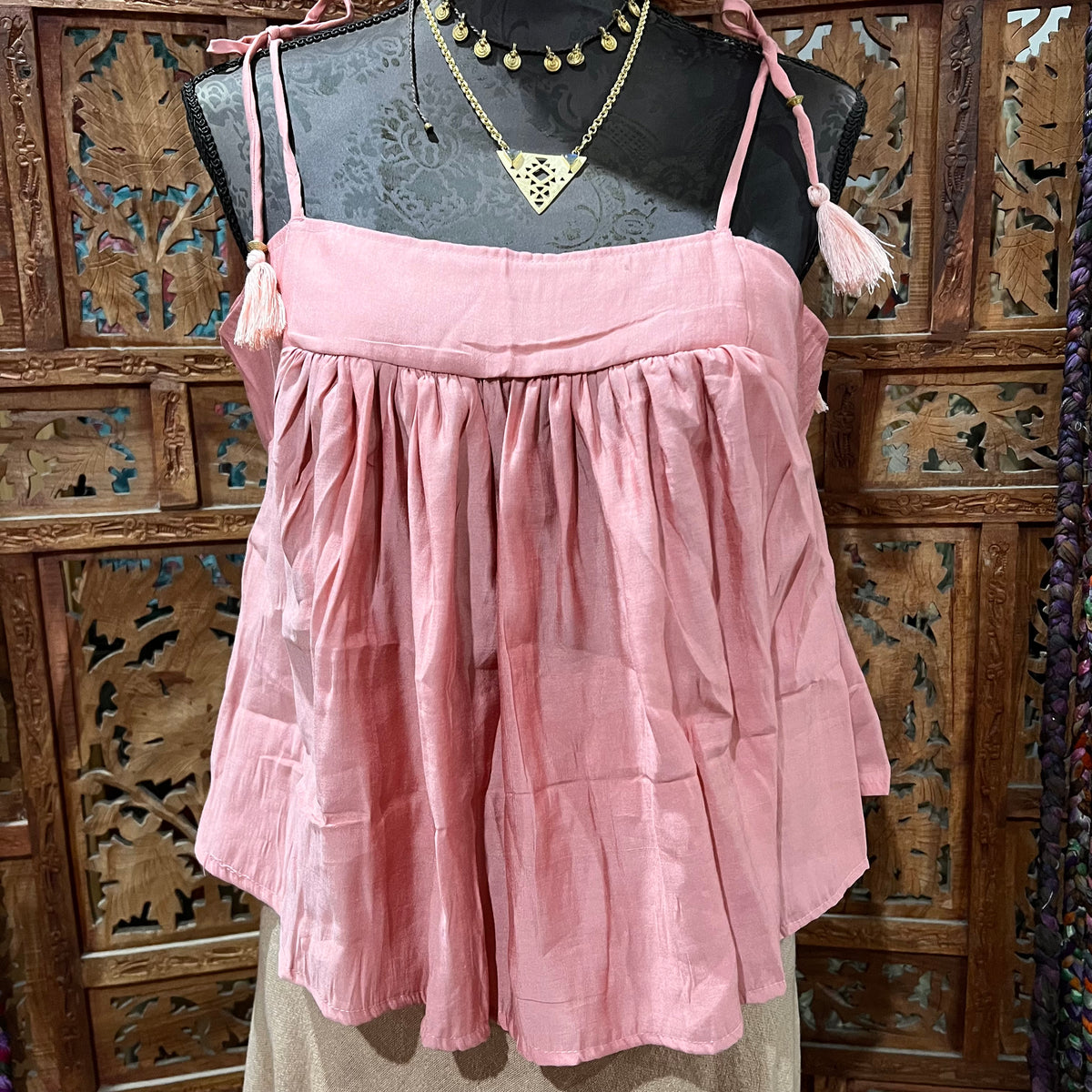 Adjustable Rayon Swing Top from Open Hearts Mend, featuring lightweight rayon fabric, adjustable tie straps, and a swing silhouette. Perfect for sizes 8 to 12, available in various colors and patterns.