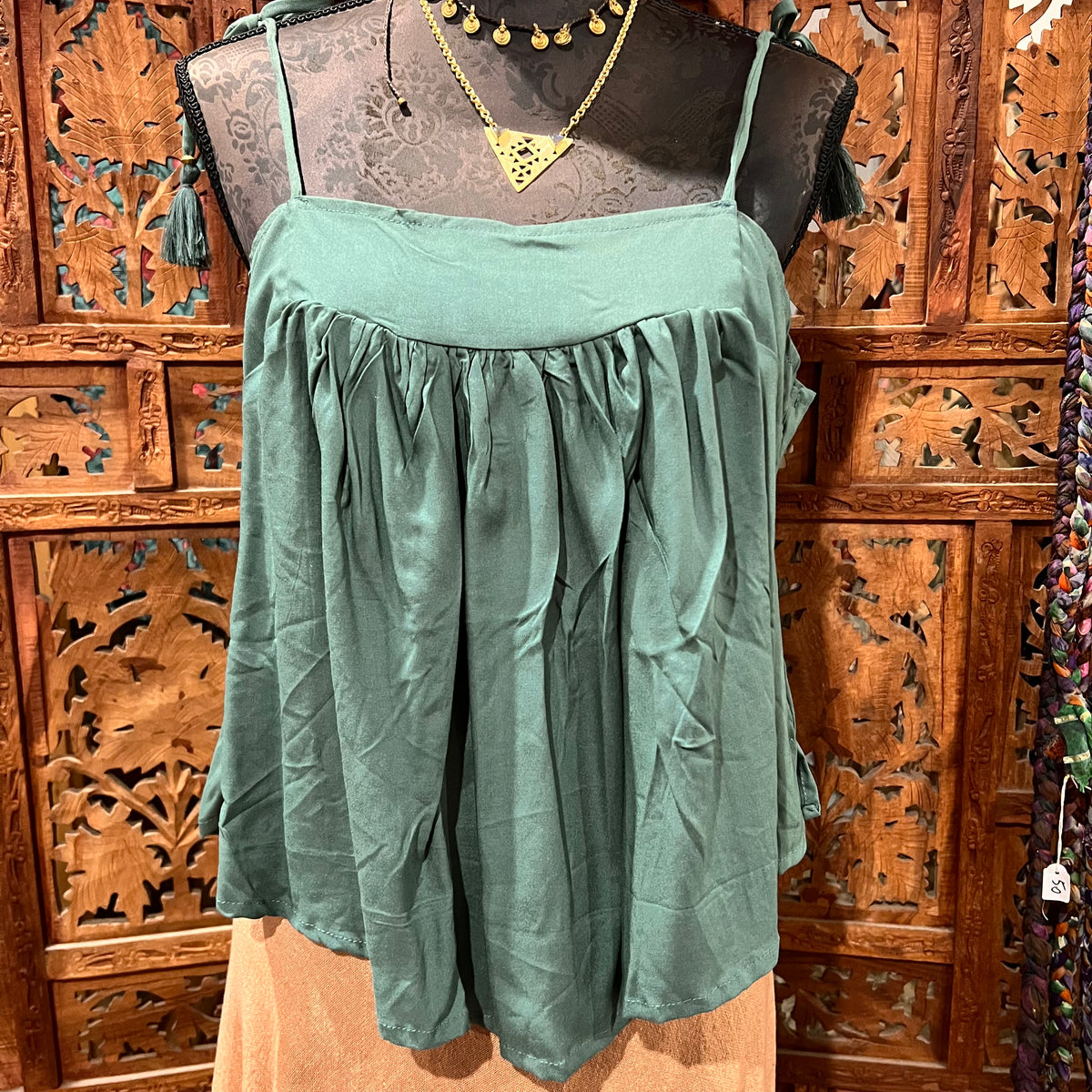 Adjustable Rayon Swing Top from Open Hearts Mend, featuring lightweight rayon fabric, adjustable tie straps, and a swing silhouette. Perfect for sizes 8 to 12, available in various colors and patterns.