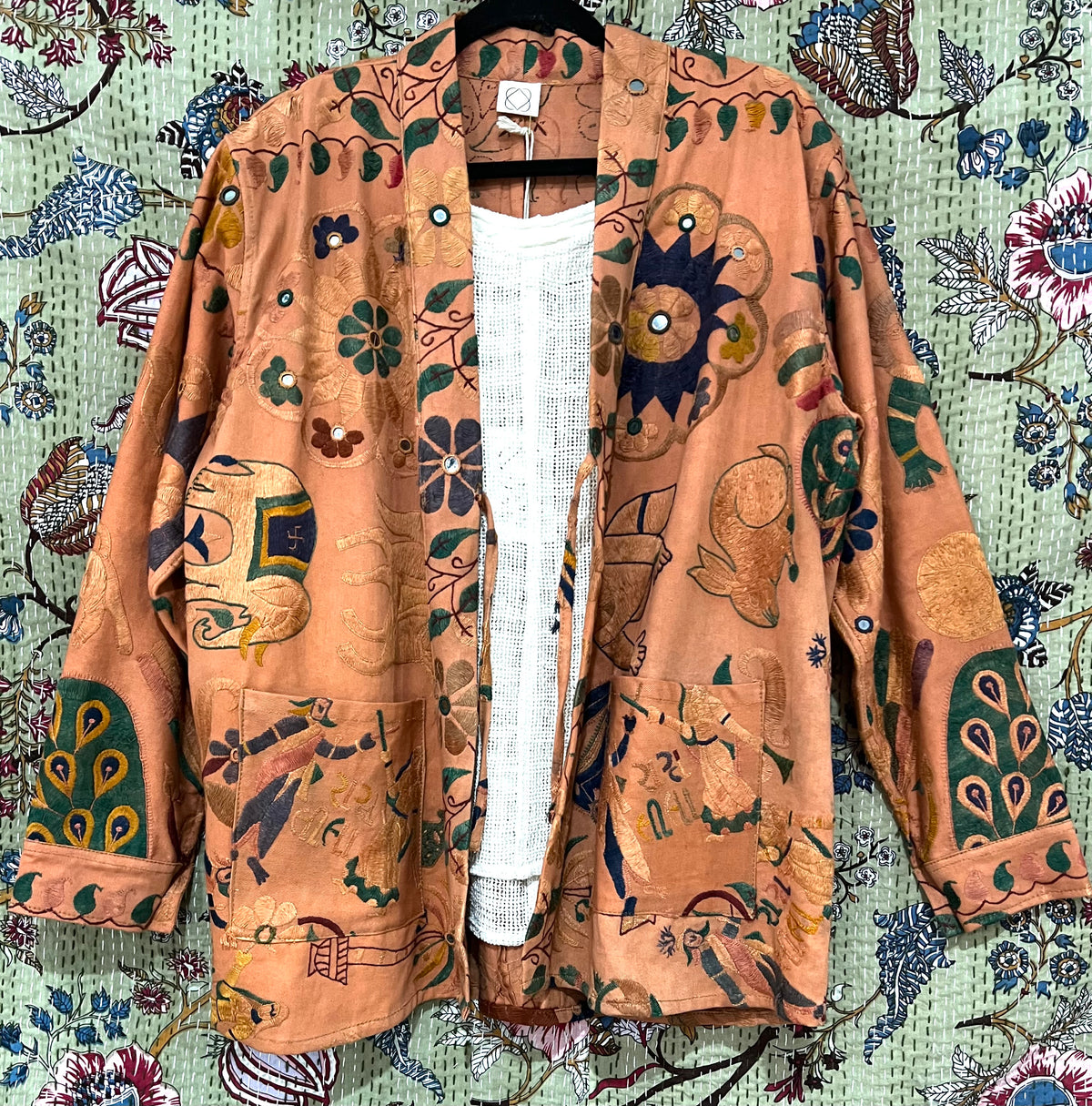 Upcycled Suzani Cotton Jacket, designed to fit sizes 8 to 12, crafted from repurposed Suzani cottons with a comfortably loose fit."