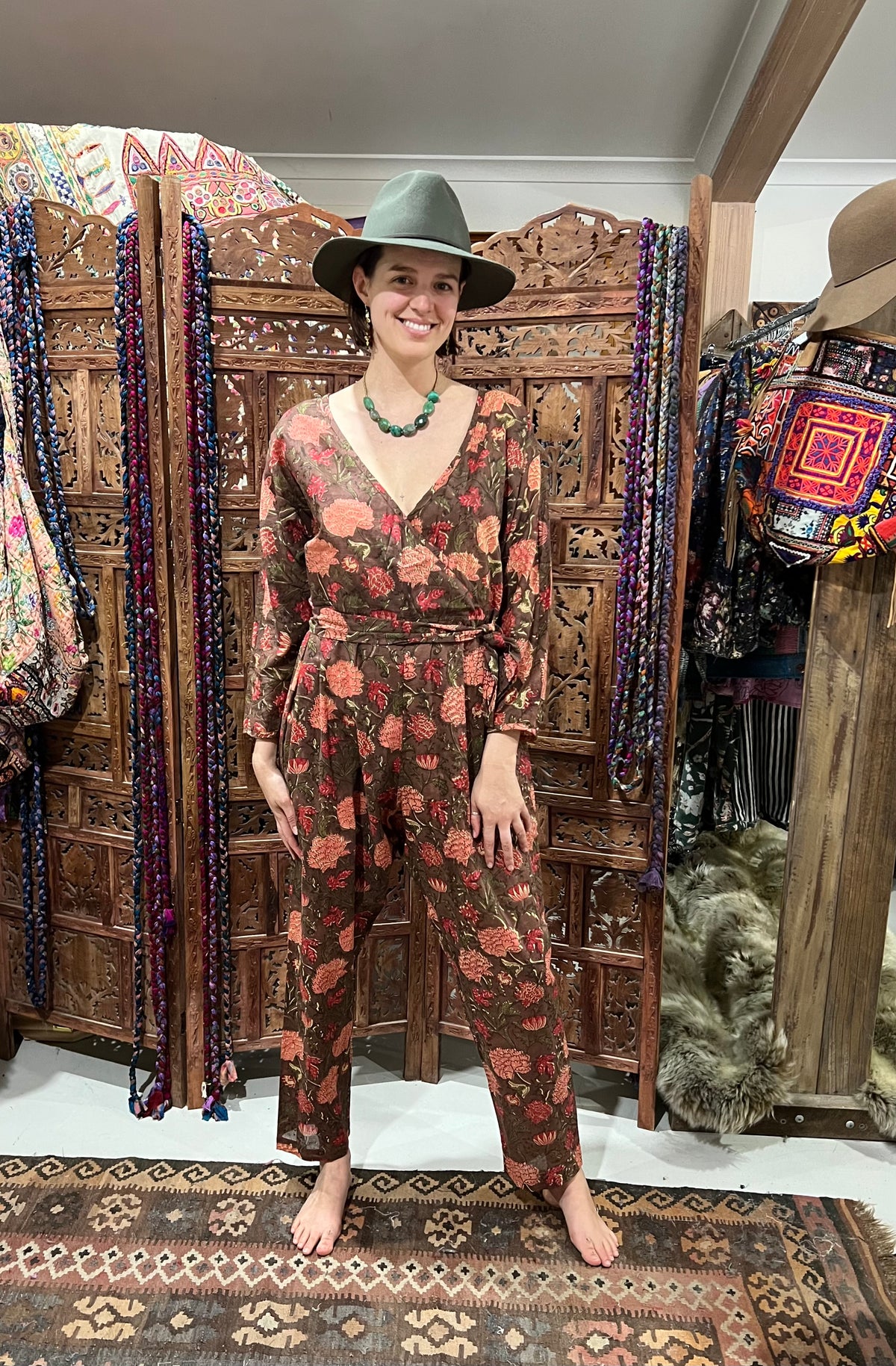 "Effortlessly chic Cotton Block Print Jumpsuit from Open Hearts Mend, featuring a low cross-way front, discreet button closure, and matching fabric belt, fits sizes 10 to 14, available in multiple colors including black and white."