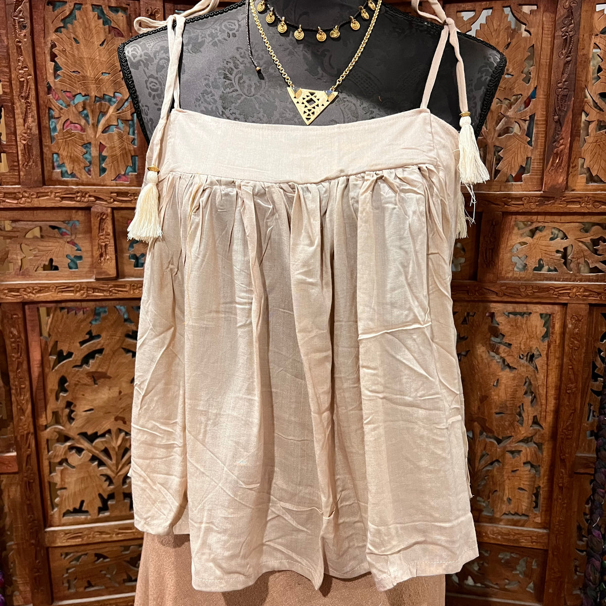 Adjustable Rayon Swing Top from Open Hearts Mend, featuring lightweight rayon fabric, adjustable tie straps, and a swing silhouette. Perfect for sizes 8 to 12, available in various colors and patterns.