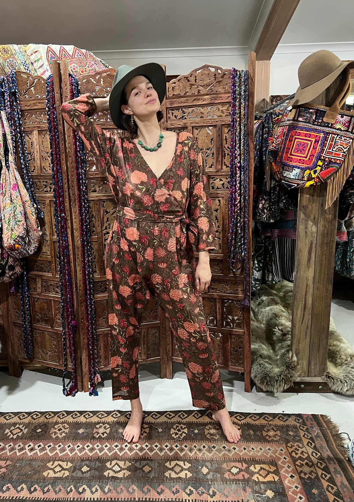 "Effortlessly chic Cotton Block Print Jumpsuit from Open Hearts Mend, featuring a low cross-way front, discreet button closure, and matching fabric belt, fits sizes 10 to 14, available in multiple colors including black and white."