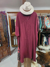 "Hand-dyed Cairo dress in soft 100% cotton, available in sizes 10-20 and colors White, Mocha, Maroon, Fern, Turmeric, Musk, Jungle, and Cream."