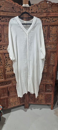 "Hand-dyed Cairo dress in soft 100% cotton, available in sizes 10-20 and colors White, Mocha, Maroon, Fern, Turmeric, Musk, Jungle, and Cream."