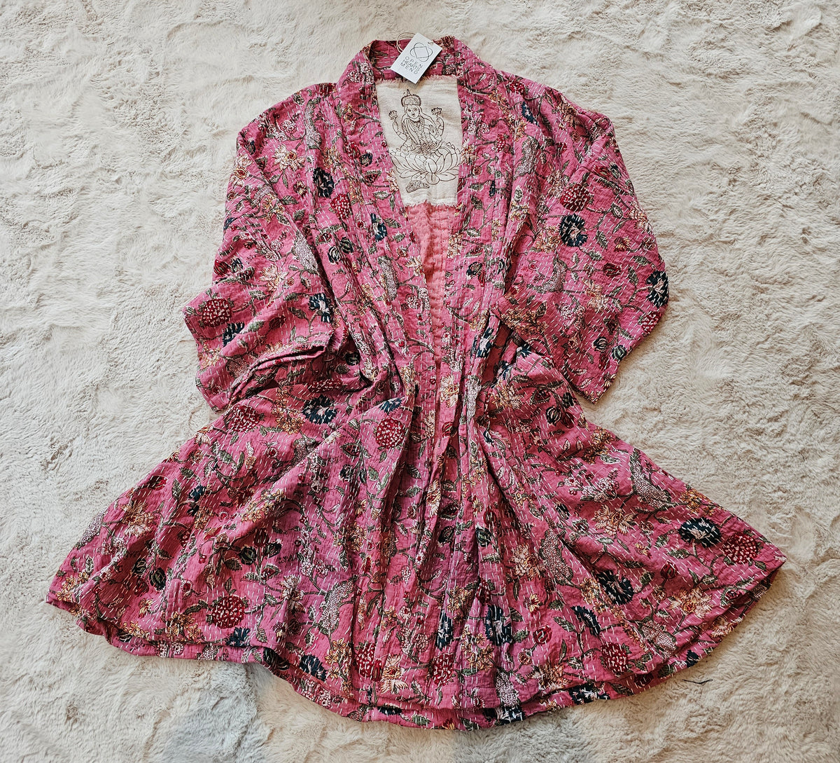 "Long cotton handsewn Kantha coat with stunning floral prints, unique small batch design, fits sizes 12-20."