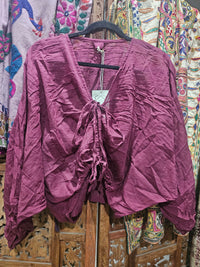 Sheer hand-dyed Indian cotton drawstring top with an adjustable fit, lightweight feel, and unique color variations, designed for effortless style and comfort.