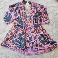 Hand-embroidered Suzani Taurus Flower Coat by Open Hearts Mend. Unique floral designs, outsize fit for sizes 10-20, one-of-a-kind craftsmanship. Perfect for adding artisanal elegance to your wardrobe.