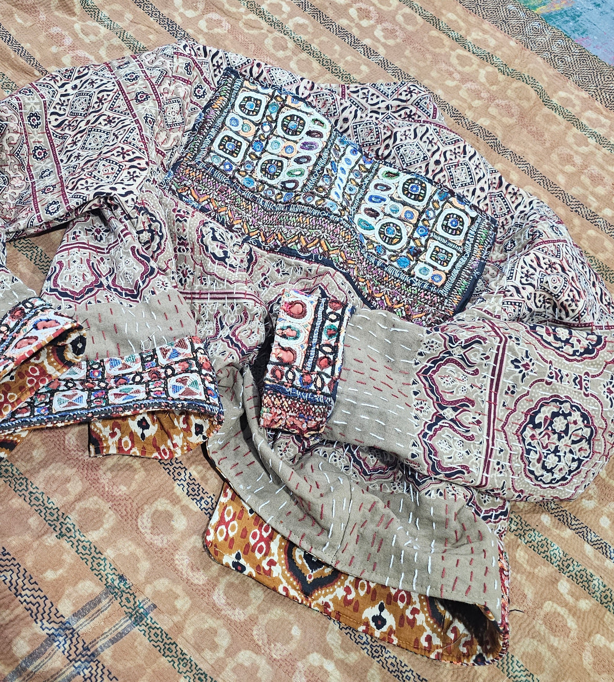 Cotton Kantha Fabric Bomber Jacket from Open Hearts Mend, designed to fit sizes 8 to 12. Each jacket is a unique expression of recycled fashion."