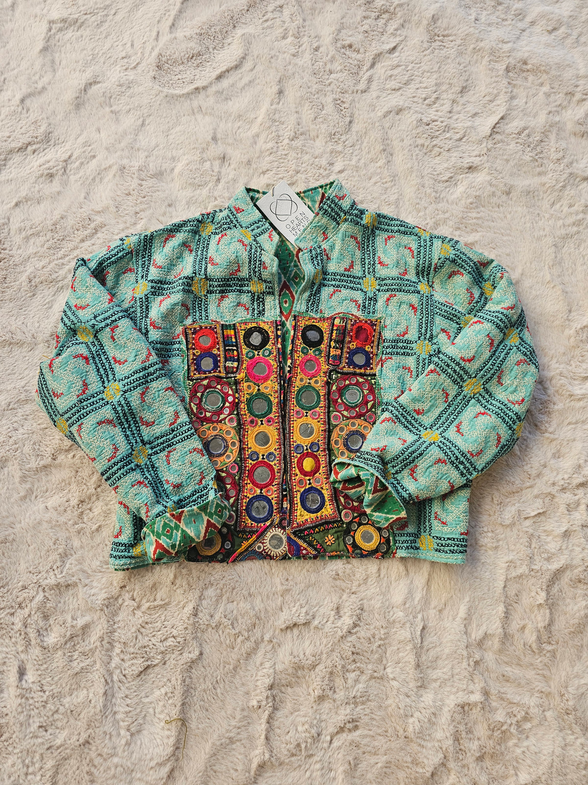 Cotton Kantha Fabric Bomber Jacket from Open Hearts Mend, designed to fit sizes 8 to 12. Each jacket is a unique expression of recycled fashion."