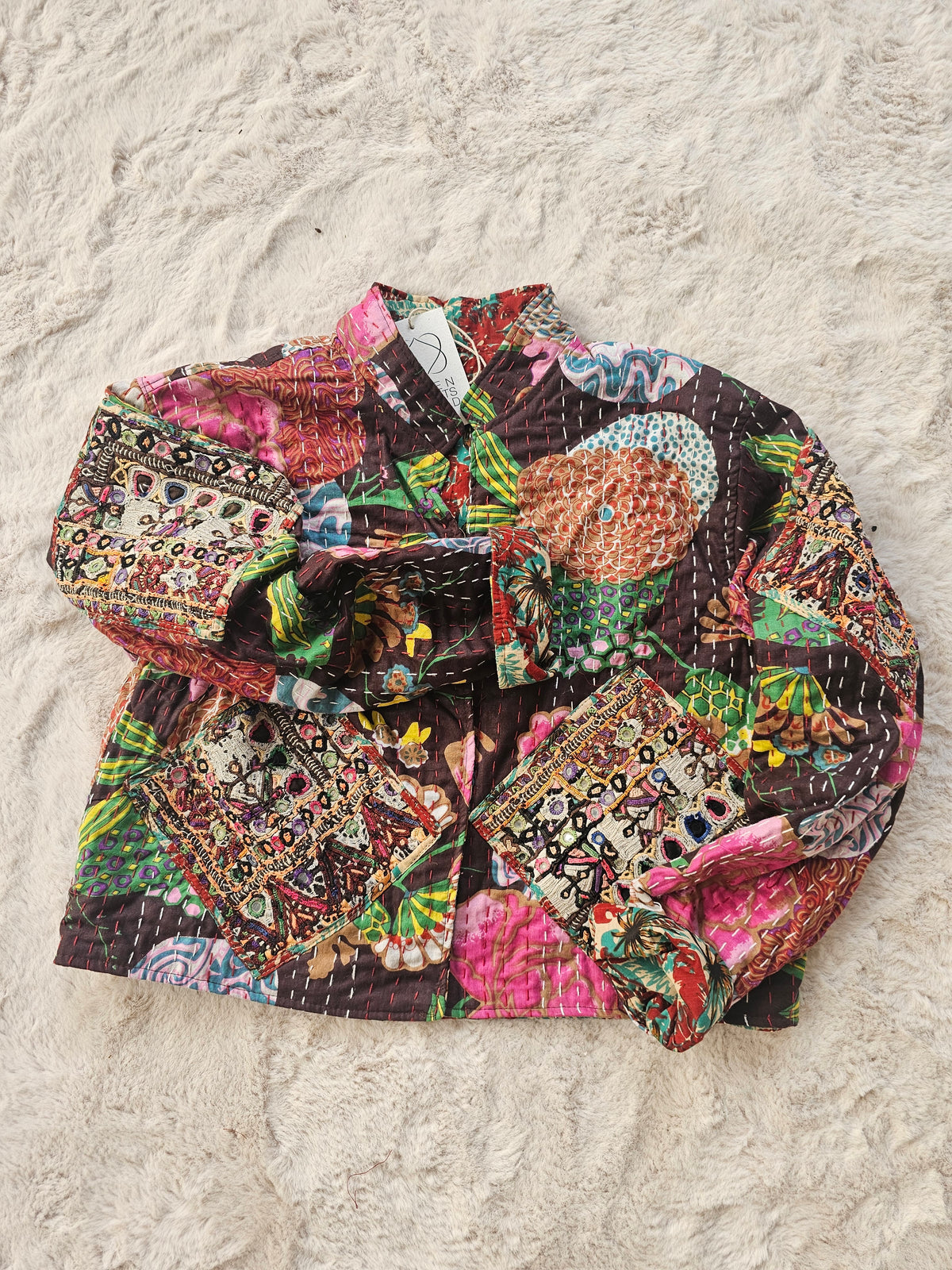 Cotton Kantha Fabric Bomber Jacket from Open Hearts Mend, designed to fit sizes 8 to 12. Each jacket is a unique expression of recycled fashion."