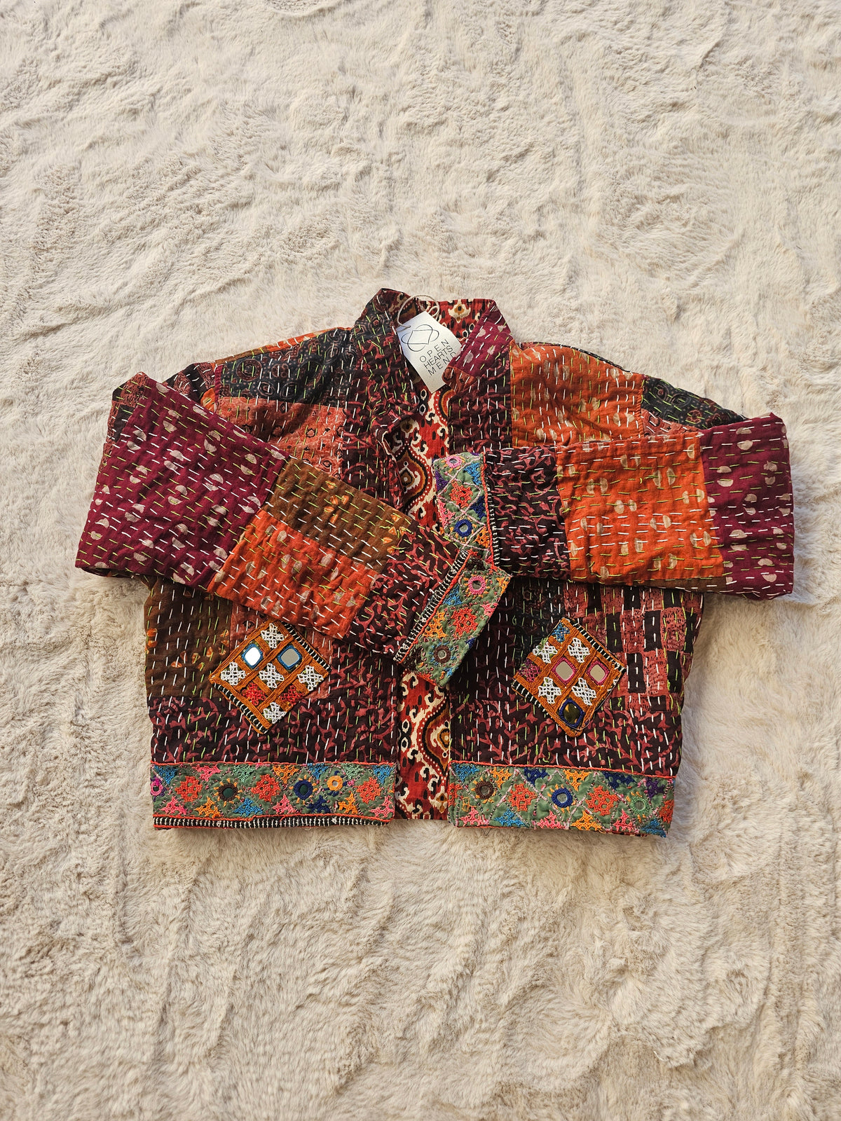 Cotton Kantha Fabric Bomber Jacket from Open Hearts Mend, designed to fit sizes 8 to 12. Each jacket is a unique expression of recycled fashion."