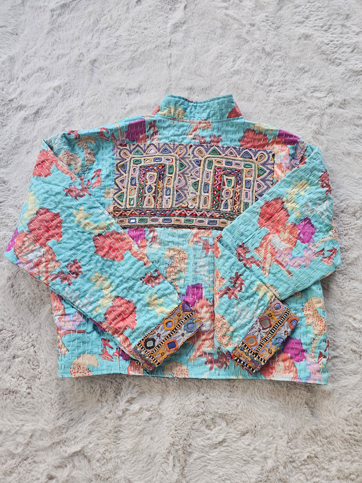 Cotton Kantha Fabric Bomber Jacket from Open Hearts Mend, designed to fit sizes 8 to 12. Each jacket is a unique expression of recycled fashion."