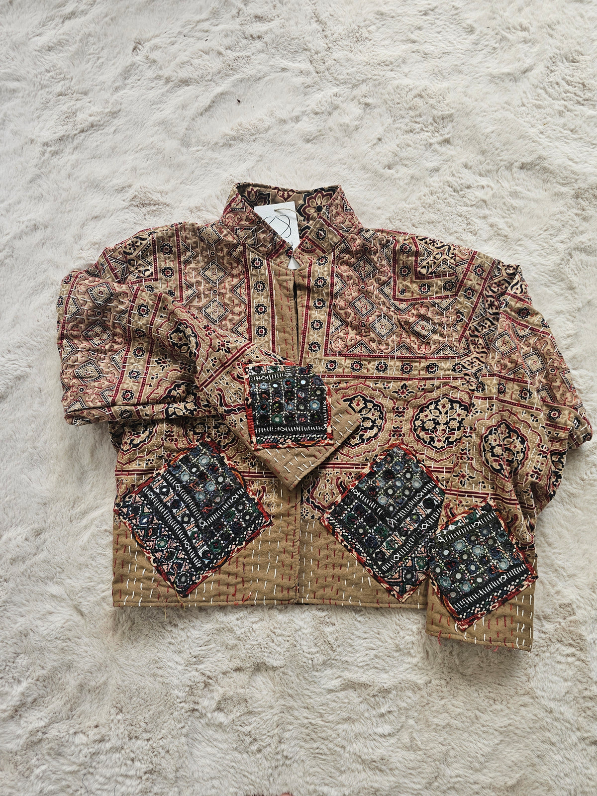 Cotton Kantha Fabric Bomber Jacket from Open Hearts Mend, designed to fit sizes 8 to 12. Each jacket is a unique expression of recycled fashion."