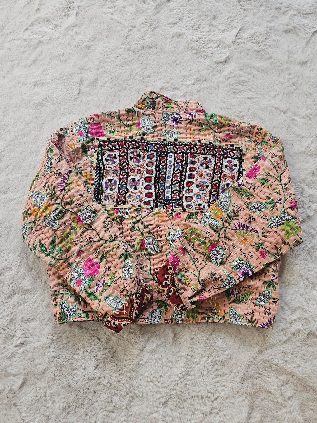 Cotton Kantha Fabric Bomber Jacket from Open Hearts Mend, designed to fit sizes 8 to 12. Each jacket is a unique expression of recycled fashion."