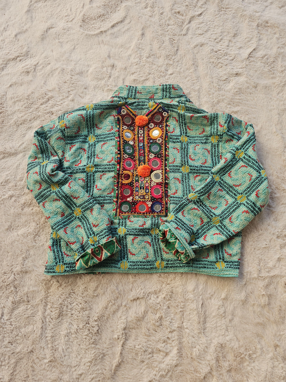 Cotton Kantha Fabric Bomber Jacket from Open Hearts Mend, designed to fit sizes 8 to 12. Each jacket is a unique expression of recycled fashion."