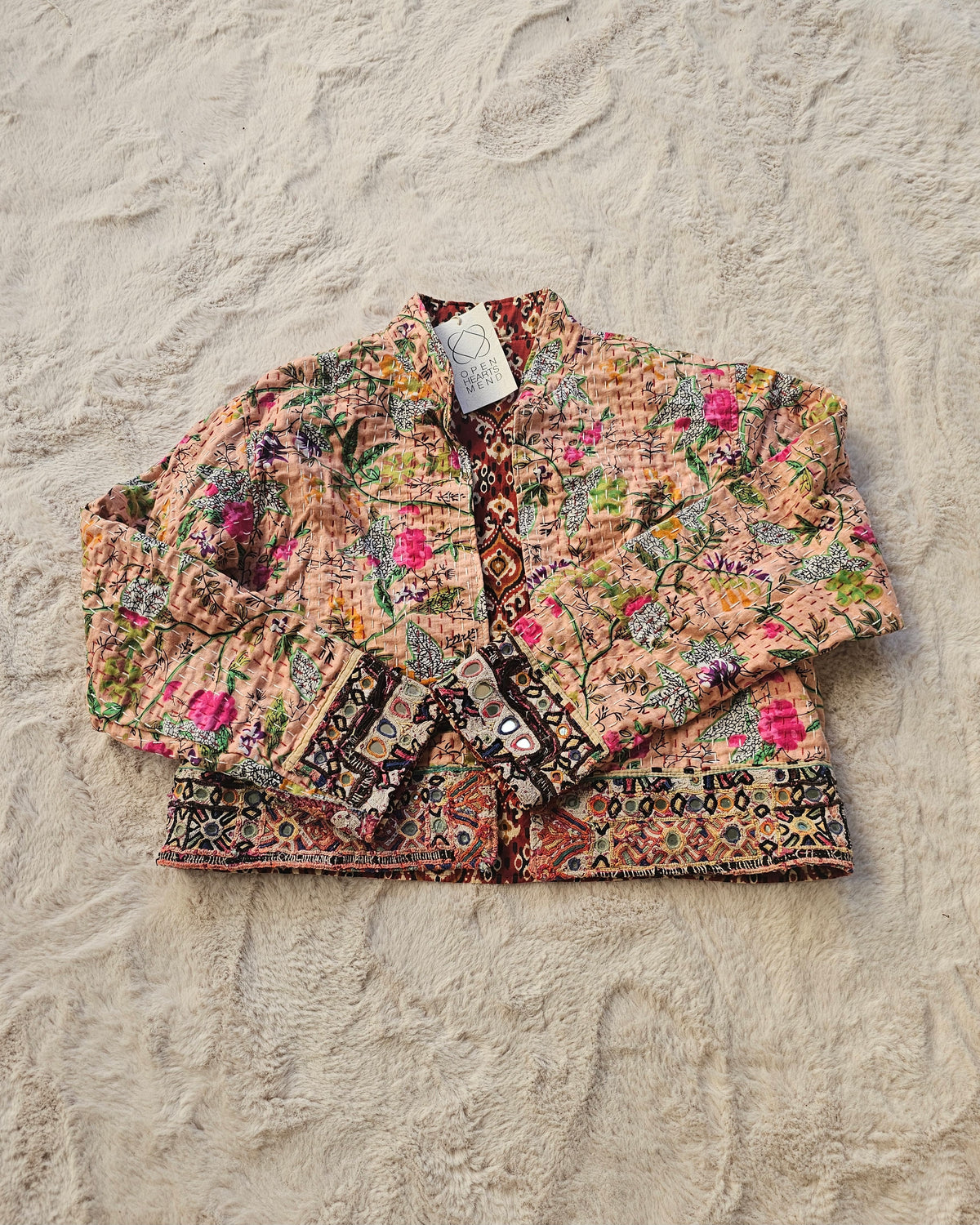 Cotton Kantha Fabric Bomber Jacket from Open Hearts Mend, designed to fit sizes 8 to 12. Each jacket is a unique expression of recycled fashion."