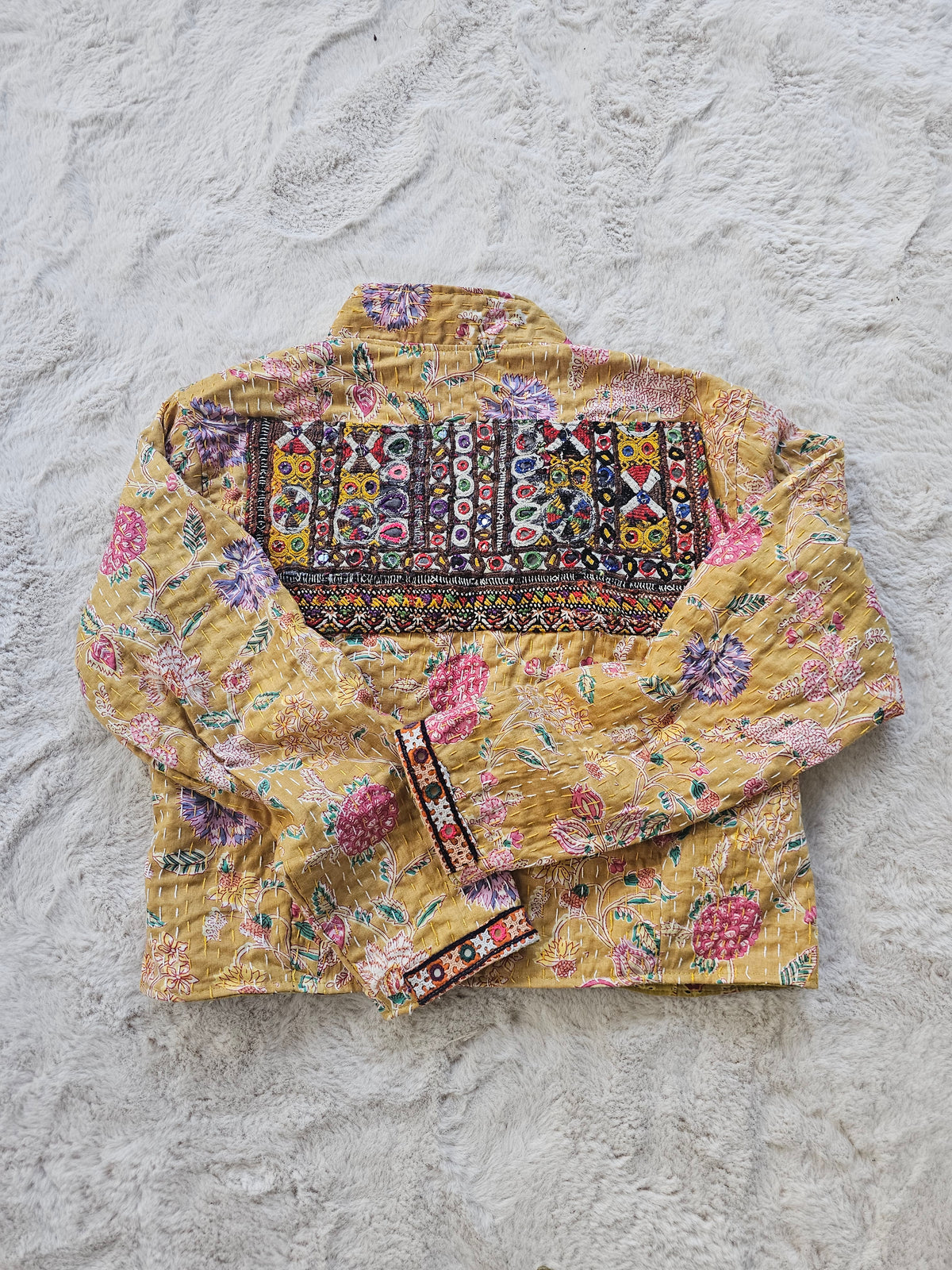 Cotton Kantha Fabric Bomber Jacket from Open Hearts Mend, designed to fit sizes 8 to 12. Each jacket is a unique expression of recycled fashion."