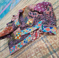 Cotton Kantha Fabric Bomber Jacket from Open Hearts Mend, designed to fit sizes 8 to 12. Each jacket is a unique expression of recycled fashion."