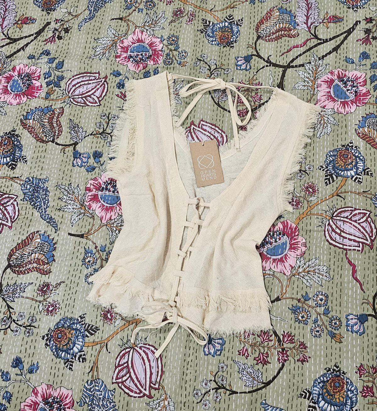 Frayed Cotton Tie-Up Top from Open Hearts Mend, featuring a U-shape neckline, available in S/M and M/L sizes in cream, black, mist, turmeric, and musk.