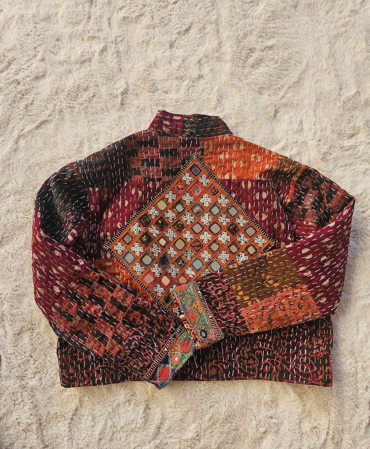 Cotton Kantha Fabric Bomber Jacket from Open Hearts Mend, designed to fit sizes 8 to 12. Each jacket is a unique expression of recycled fashion."