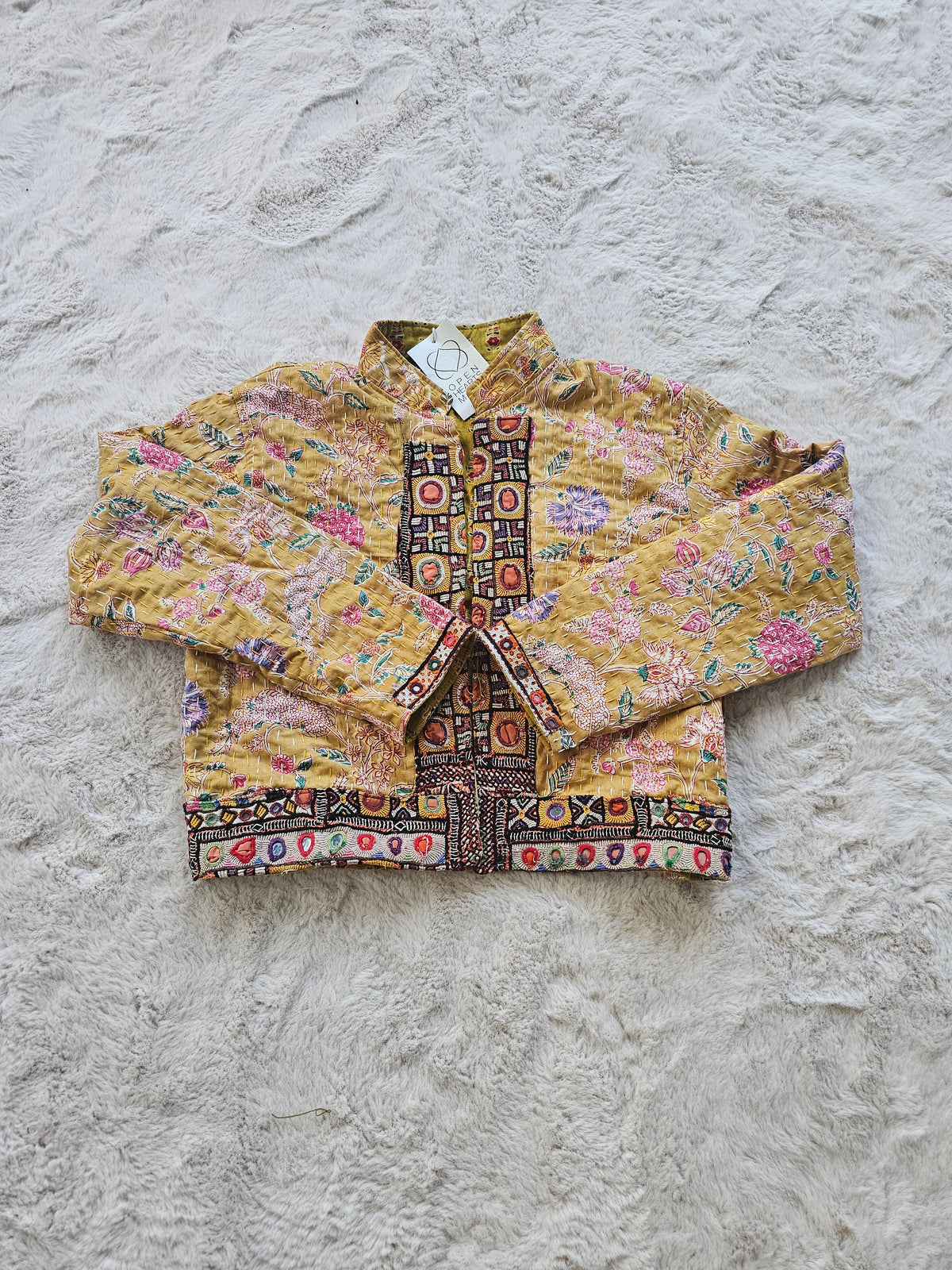 Cotton Kantha Fabric Bomber Jacket from Open Hearts Mend, designed to fit sizes 8 to 12. Each jacket is a unique expression of recycled fashion."