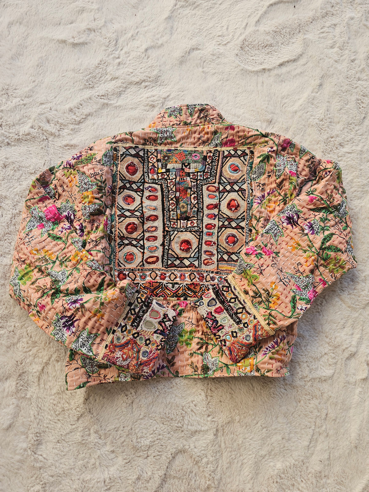 Cotton Kantha Fabric Bomber Jacket from Open Hearts Mend, designed to fit sizes 8 to 12. Each jacket is a unique expression of recycled fashion."