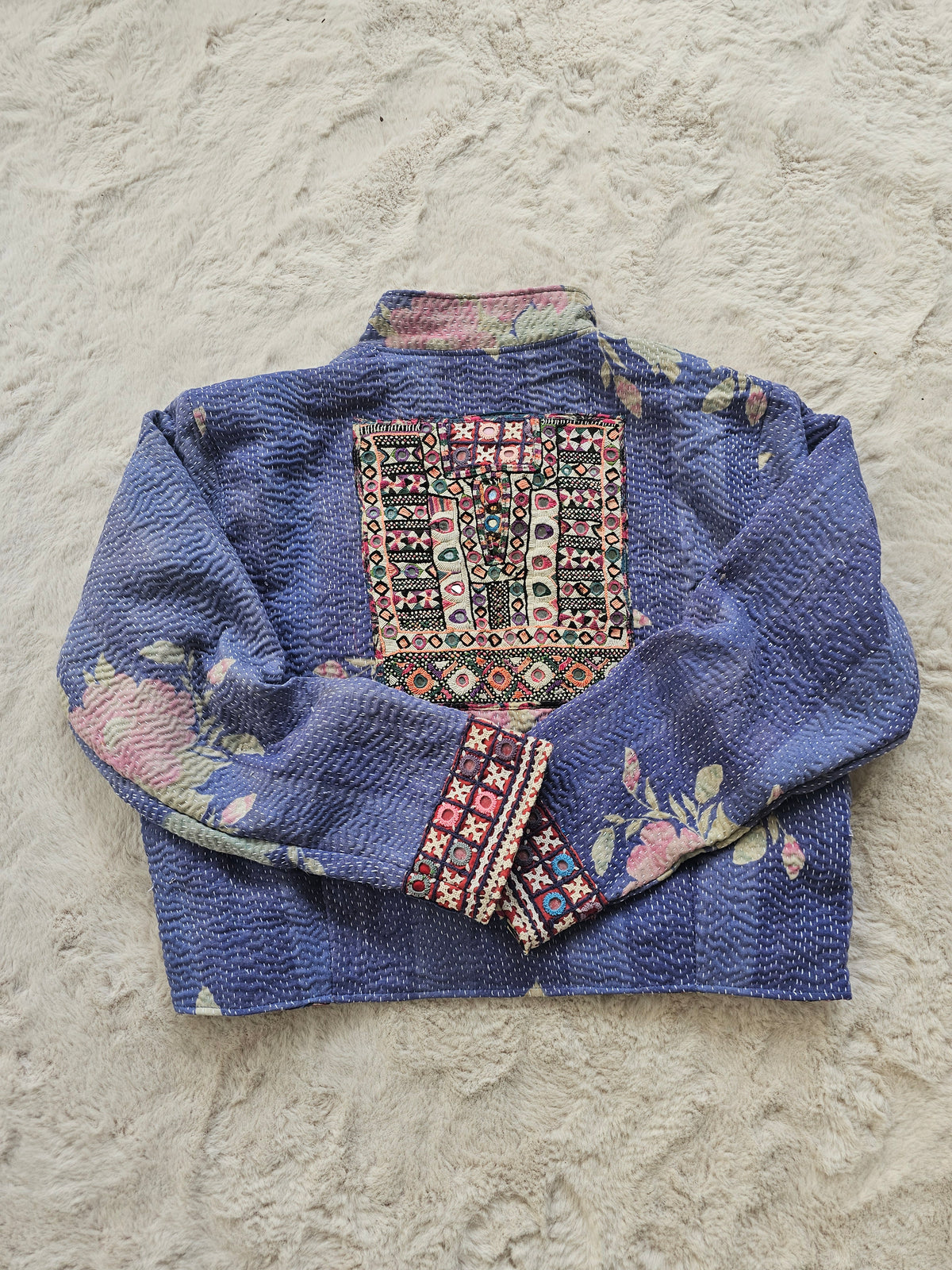 Cotton Kantha Fabric Bomber Jacket from Open Hearts Mend, designed to fit sizes 8 to 12. Each jacket is a unique expression of recycled fashion."