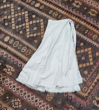 Hand-Dyed Cotton Wrap Skirt from Open Hearts Mend, crafted with hand-woven cotton and uniquely dyed in earthy tones. Approximately 90cm long, suitable for sizes 8 to 16.