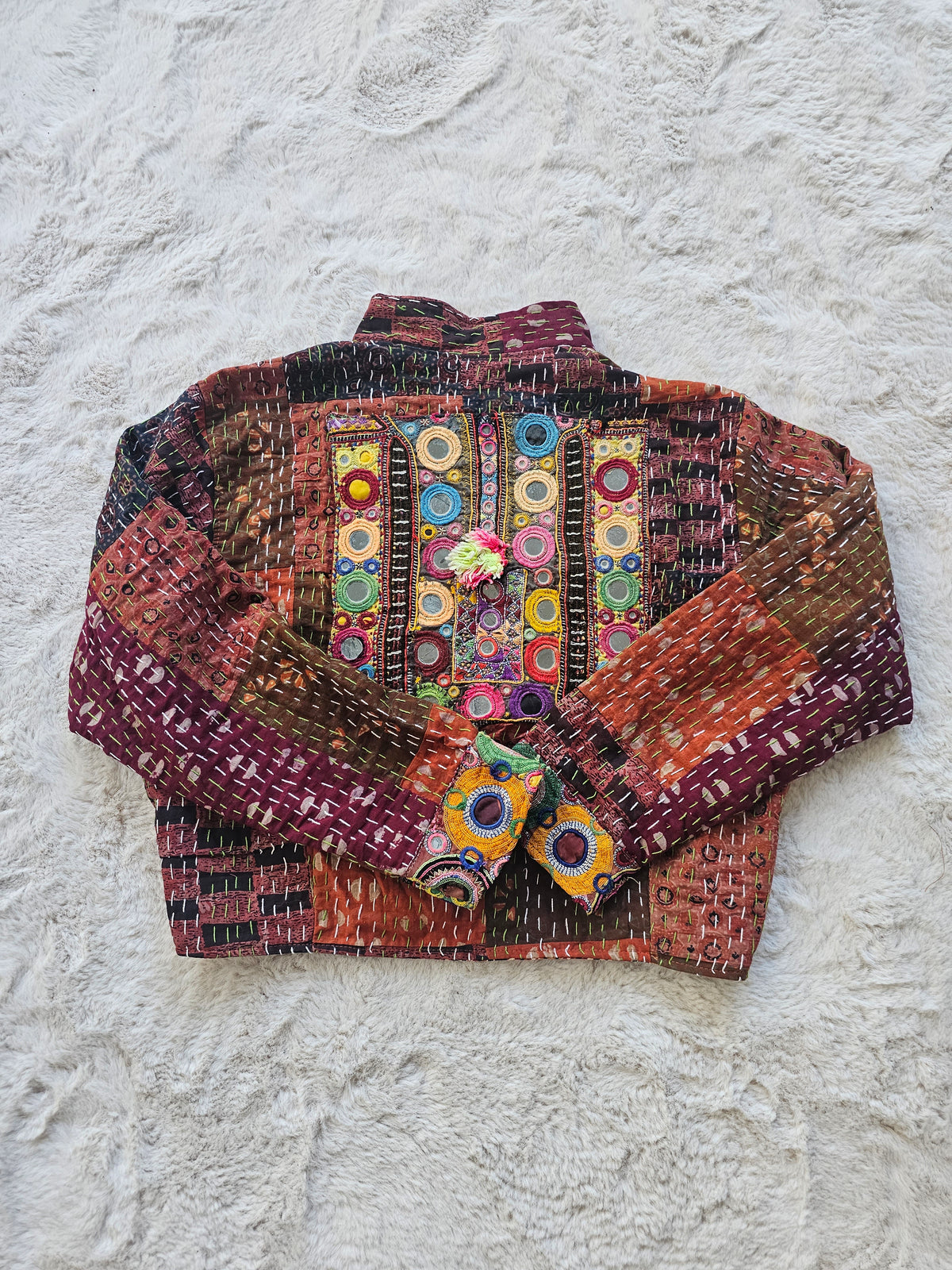 Cotton Kantha Fabric Bomber Jacket from Open Hearts Mend, designed to fit sizes 8 to 12. Each jacket is a unique expression of recycled fashion."