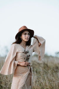  Hand-Dyed Cotton Wrap Tops from Open Hearts Mend, featuring sleeves and a waistline wrap design for sizes 8 to 12. Available in earthy hues reflecting natural beauty."